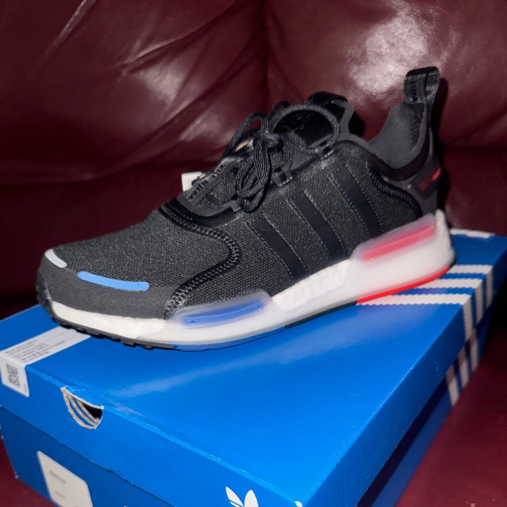 Adidas Black Athletic Shoes with Blue and Red Accents